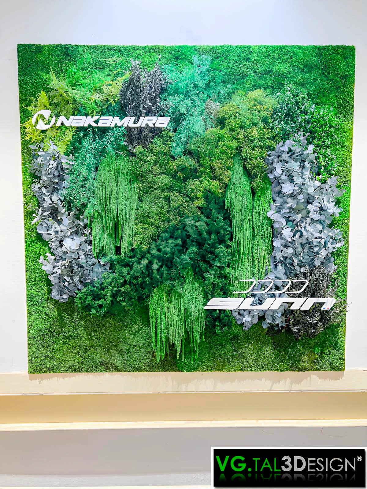 Letreiro Nakamura numa composição vegetal realizada para a Intersport em Toulouse